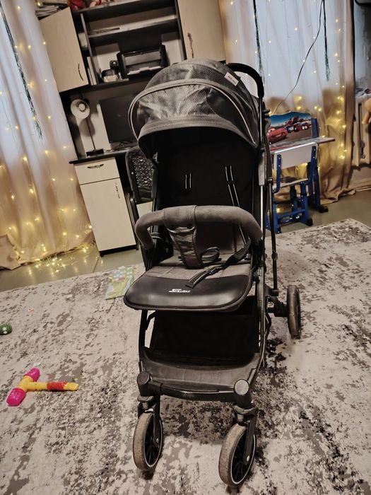 Коляска для детей чемодан.