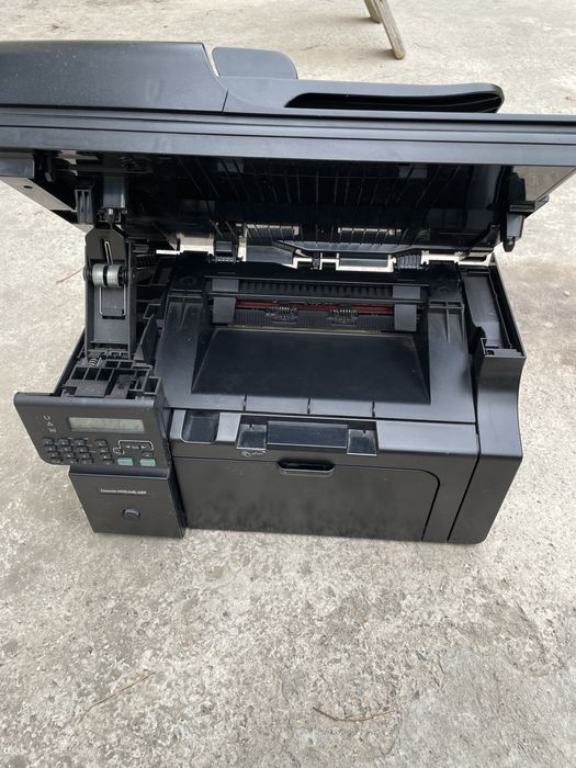 Принтер HP LaserJet M1214nfh MFP.