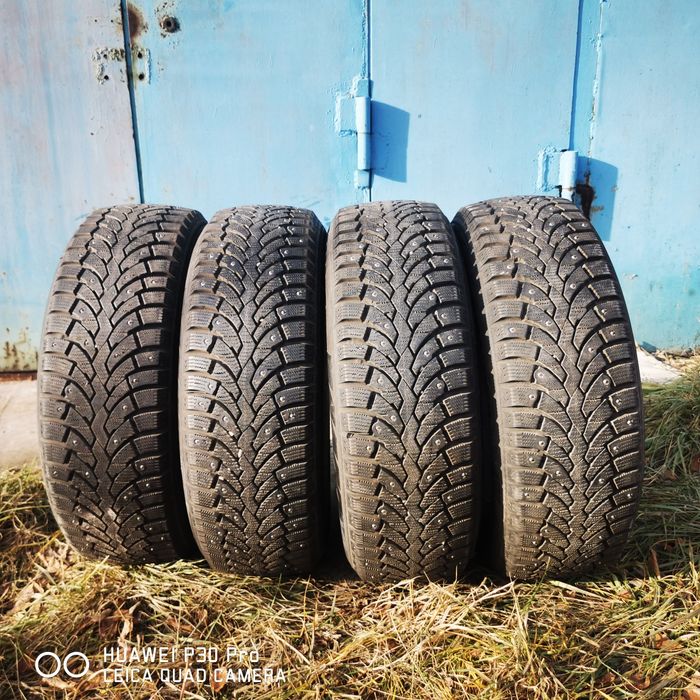 Продам шипованные шинны