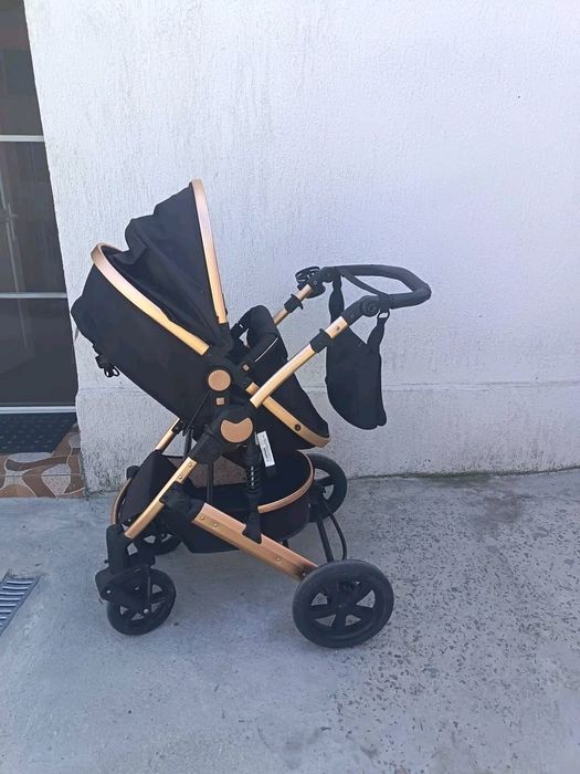 Carucior 3 in 1 cu suspensii duble