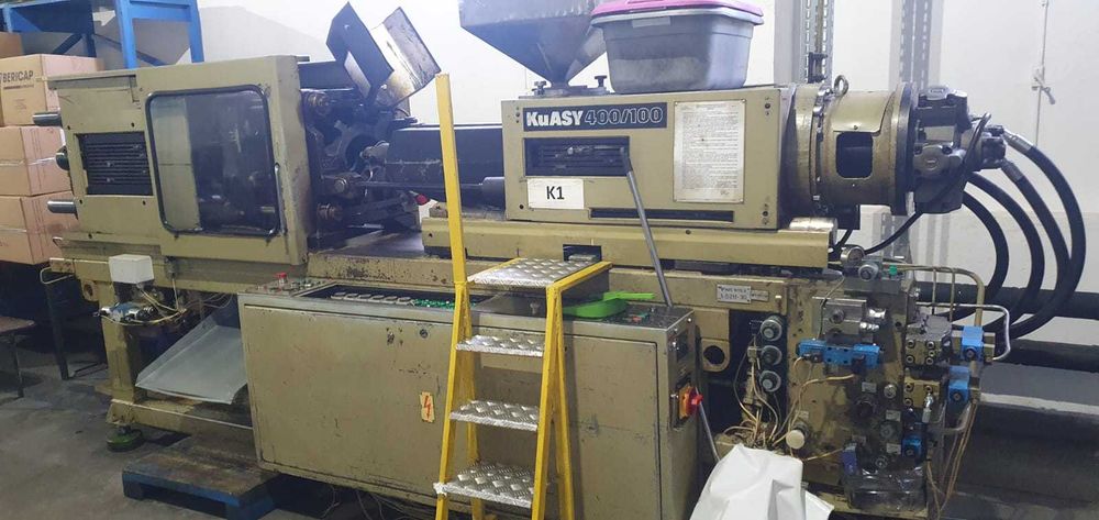 Masini de injectie mase plastice