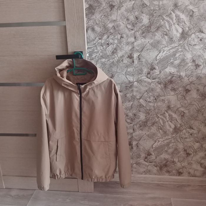 Продам ветровку новую