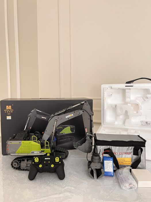 Игрушка радиоуправляемый экскаватор