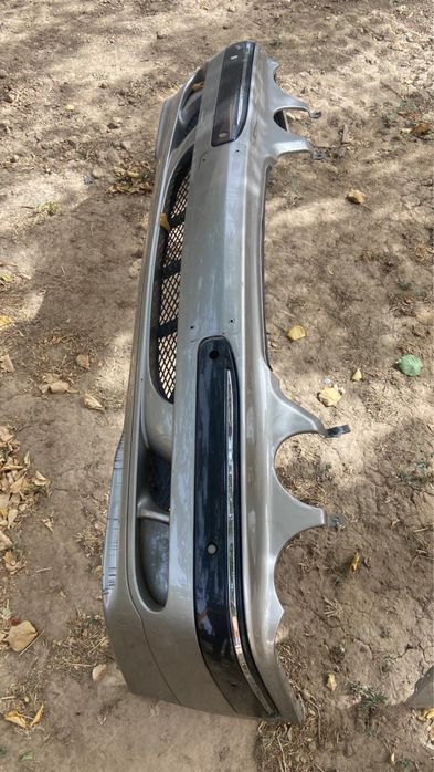 Мерседес 210 лупарик оригинал передний бампер