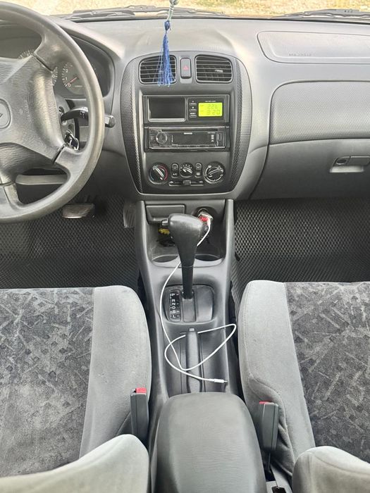 Машина мазда 323 F