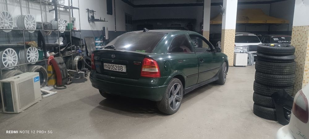 Опель Астра Дж купе