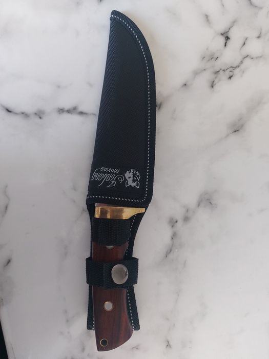 Кухонный нож для мясо