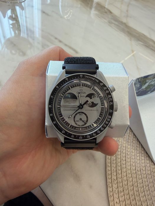 Omega Swatch часы