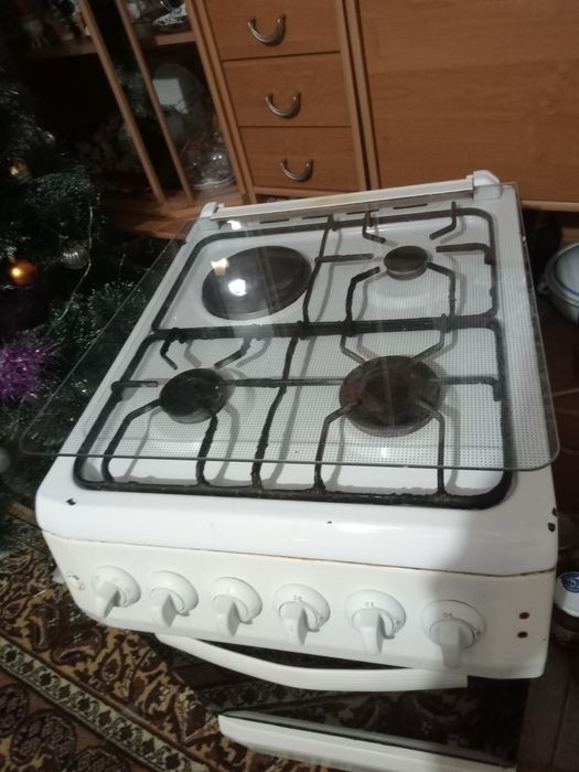 Продам комбинированую плиту