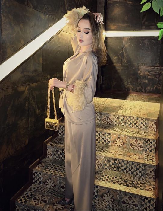 Двойка с перьями