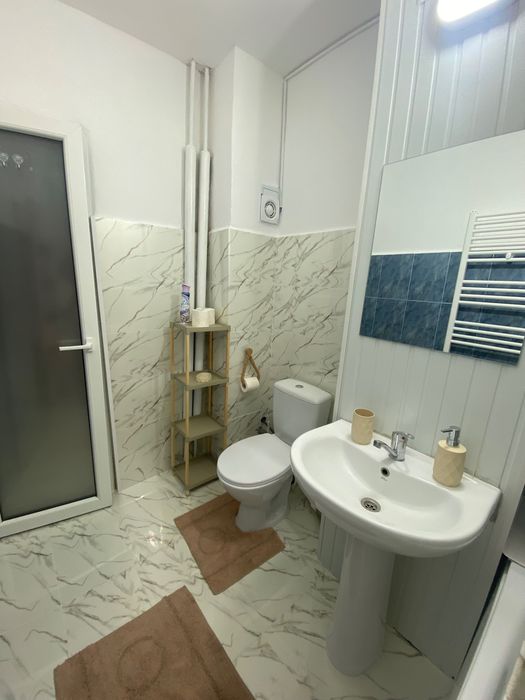 Vand apartament 2 camere semidecomandat Rosiori de vede