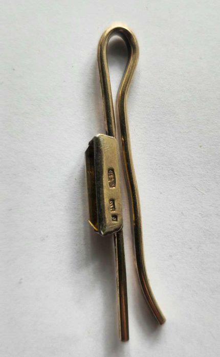 Заколка для галстука.