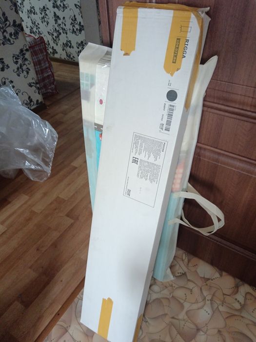 Напольная вешалка на колесиках Rigga