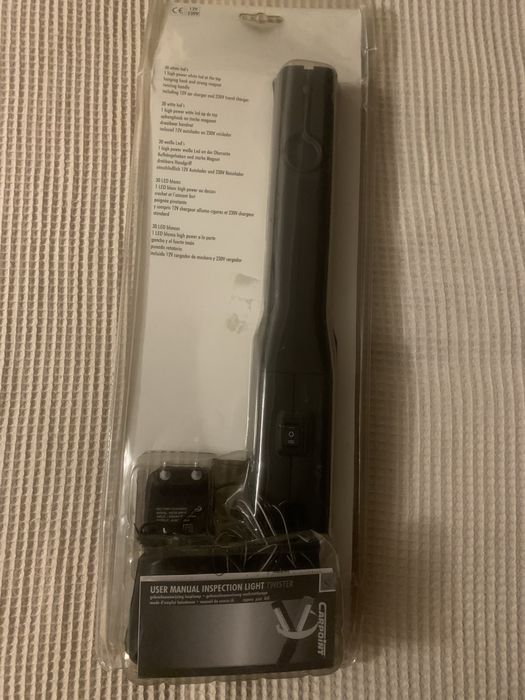 Фонарь , зарядка -новый.