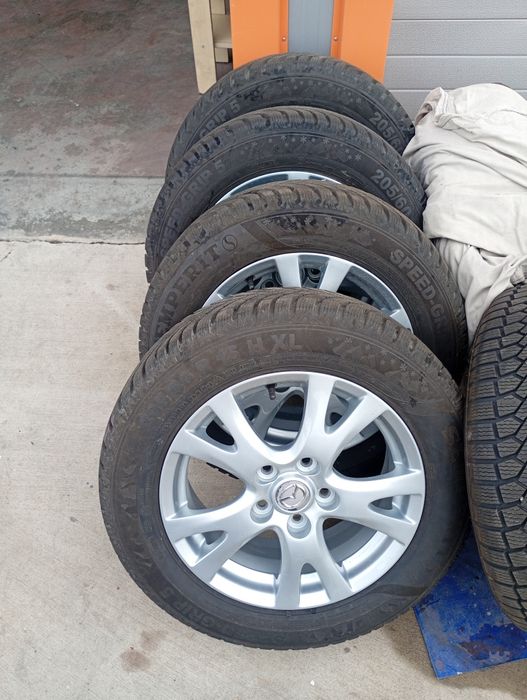 Зимни гуми с джанти Мазда 800лв 205/60 R16 н hl