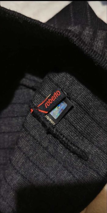 Caciula Roberto Cavali