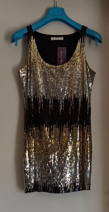 Официални блестящи рокли с лоторки сребристи златисти и черни цветове.