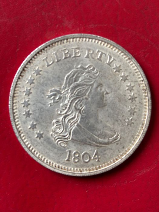 Монета one dollar