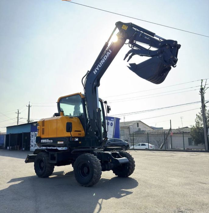 Экскаватор хизмати.