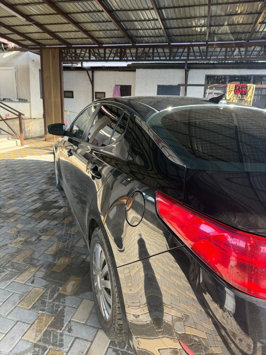 Kia optima 2014 года