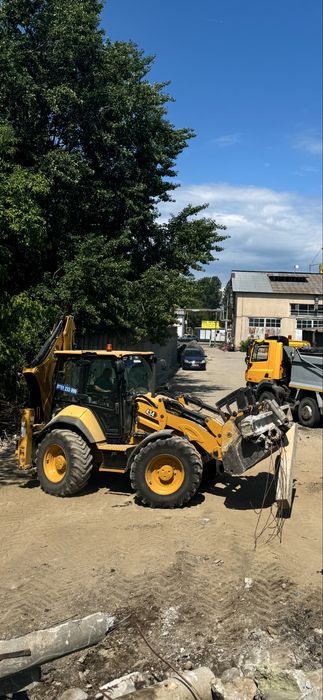 Inchiriere  buldoexcavator Caterpillar 434 roti egale