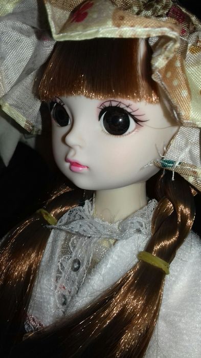 кукла със сгъваеми ръце и крака