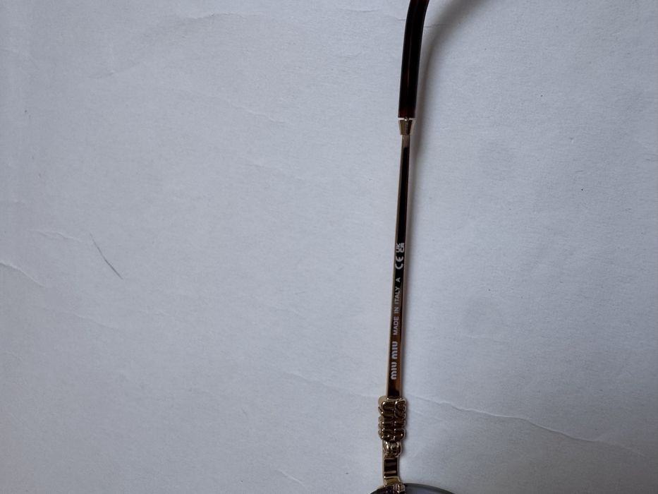 Ochelari de soare Miu Miu Oval-Rimless SMUA54 51-20 140, Noi