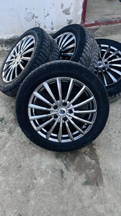 Титан с зим покрышкой