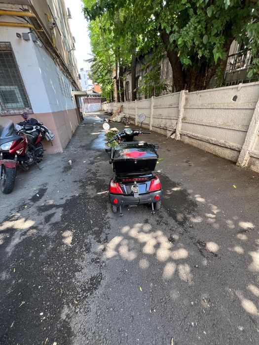 Scuter electruc pentru persoane cu dizabilitați