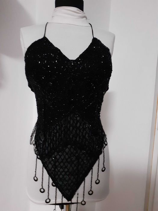 Body  si top  negre, bonus un produs la  livrare