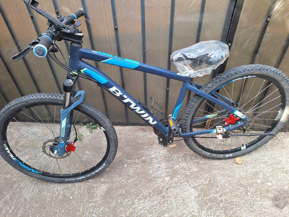 Bicicleta BTWiN roti 27,5 cadru M, Shimano Deore, reducere doar azi