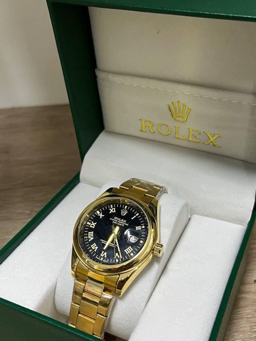 Часы Rolex Gold