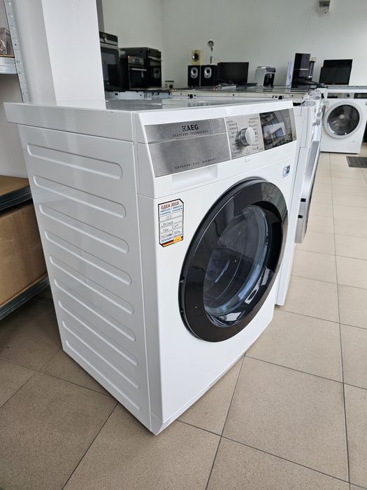 Пералня със сушилня с термопомпа AEG