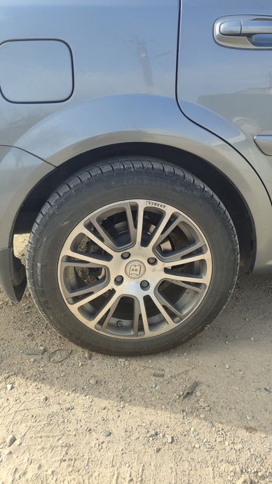 Диск с колесом для автомобиля