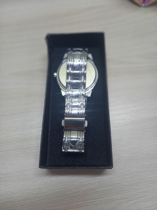 Серебряные золотые часы