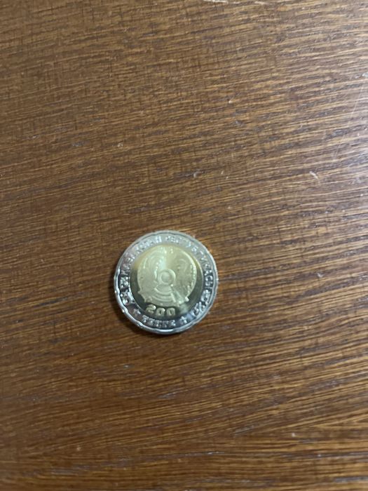 Монета 200тенге.