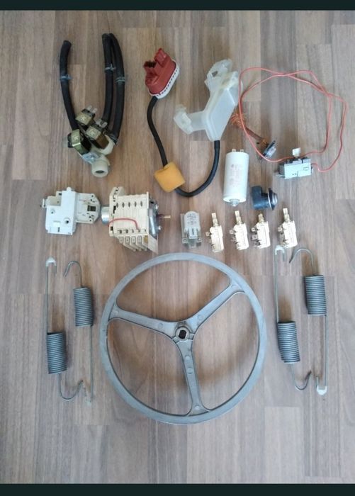 Piese electrice și mecanice pentru masini de spalat