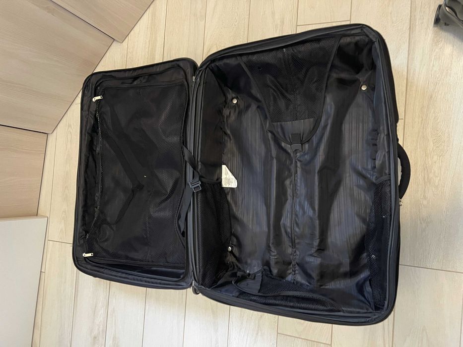 Куфар Samsonite, голям, ползван, колелцата работят префектно