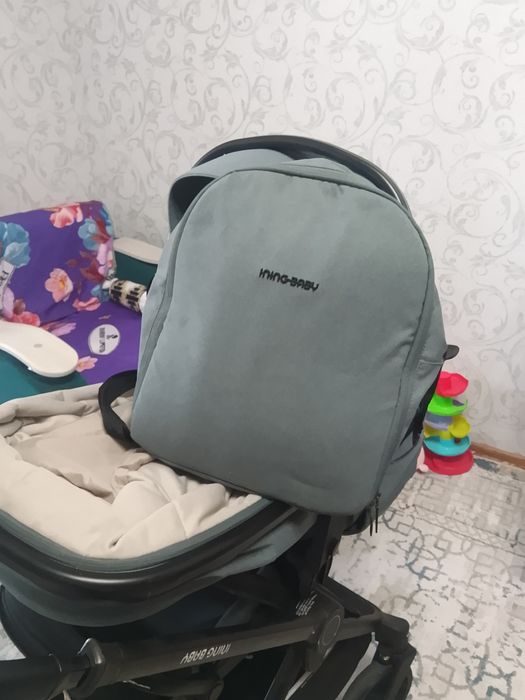 Продам универсальную коляску 2 в 1  ining baby
