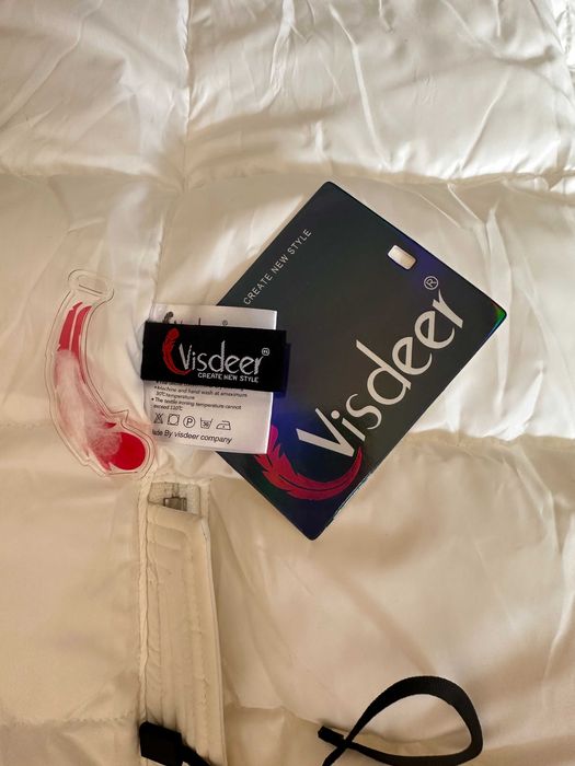 Пуховик немецкий новый