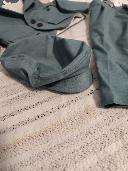Costum botez bebeluș