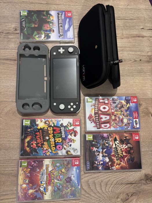 Vand consola Nintendo Switch + 5 jocuri