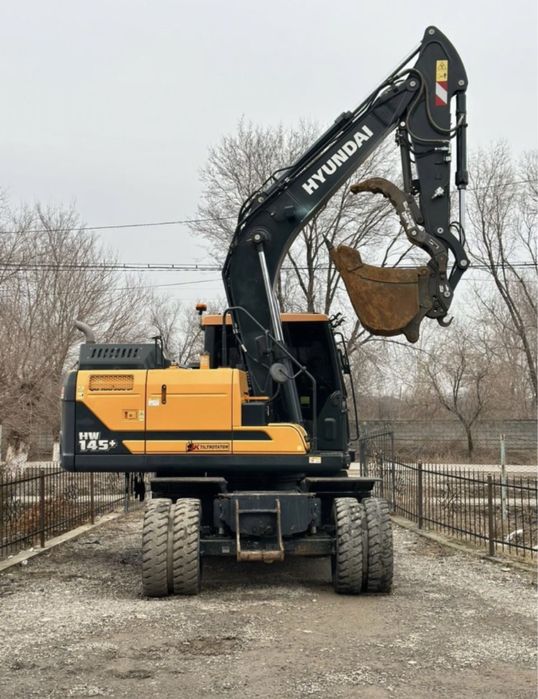 Услуги Экскаватор колесный ГИДРОМОЛОТ