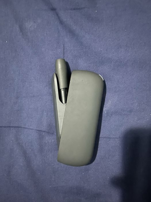 IQOS , tigara electronică.