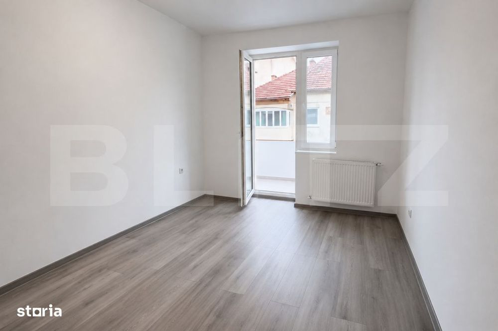 Apartament 3 camere,2 balcoane,pod,pivnita,parcare,etaj 2,zona Joagar