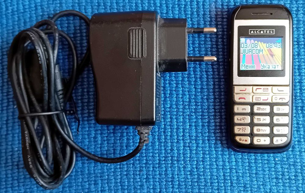 Алкател  ОТ – Е201 в отлично състояние със зарядно у-во.