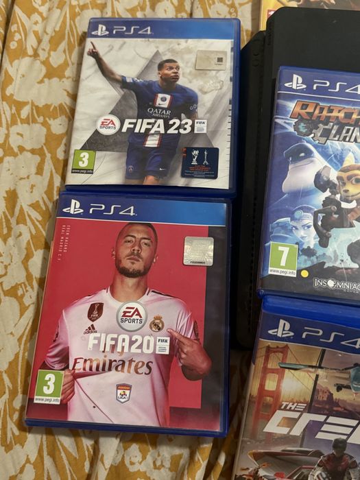 PlayStation 4 Slim 500 GB + 10 jocuri – fără manetă