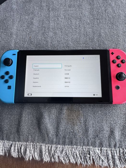 Nintendo switch (пълен комплект + 4 игри)