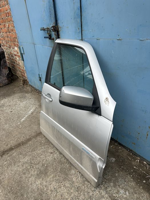 Дверь нива шевроле бертоне