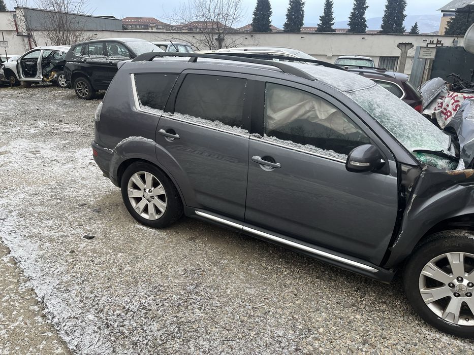 Usa fata spate mitsubishi outlander an 2011